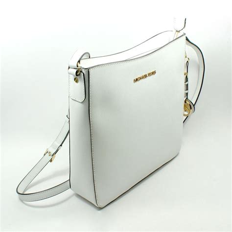 michael kors wine colored bag|Michael Kors white crossbody bag.